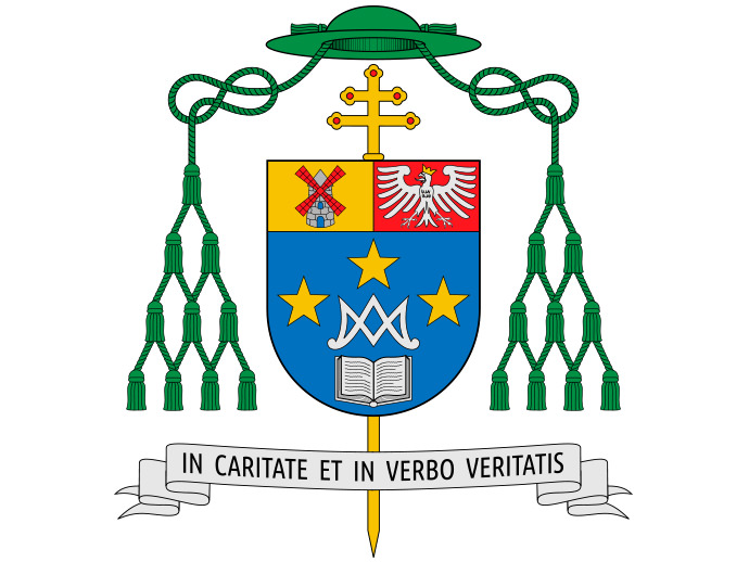 Escut d'armes de Sr. Enrique Benavent Vidal In caritate et in verbo veritatis (En amor i en paraula de veritat)